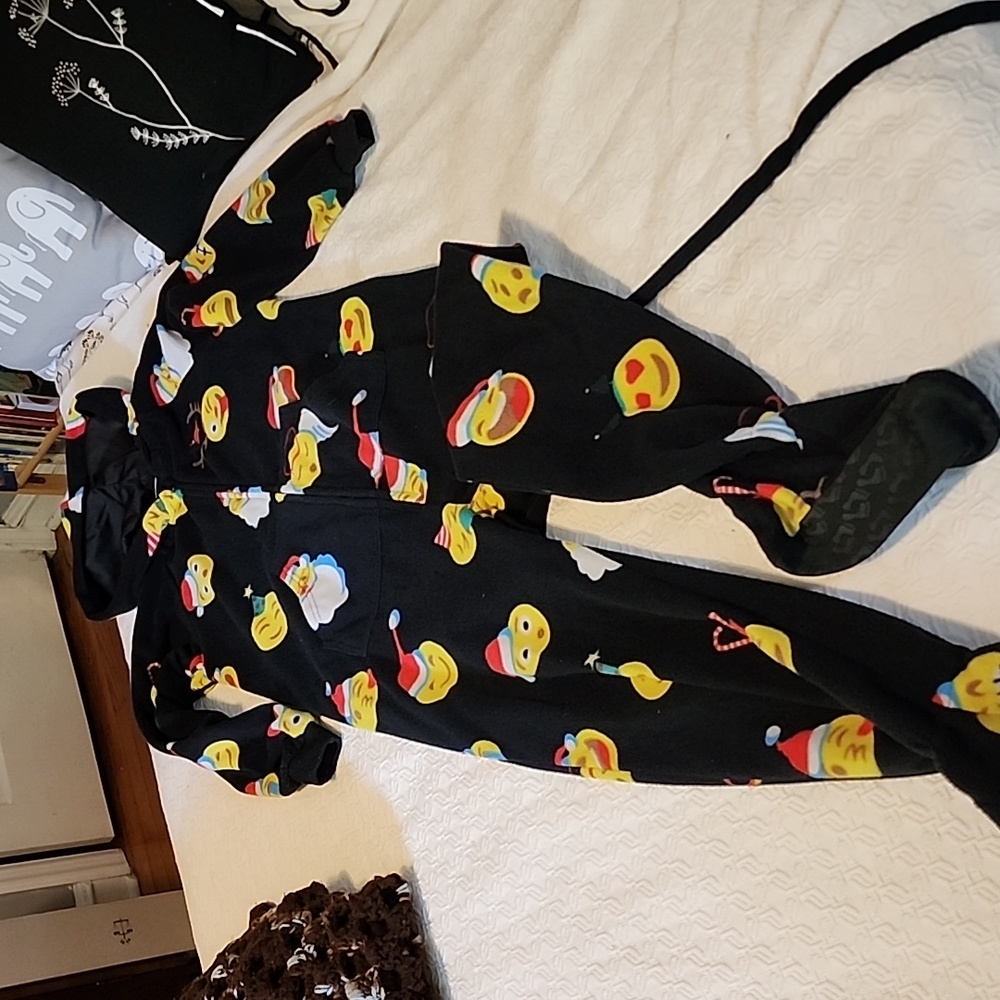 Kids size medium fleece footie pajamas.